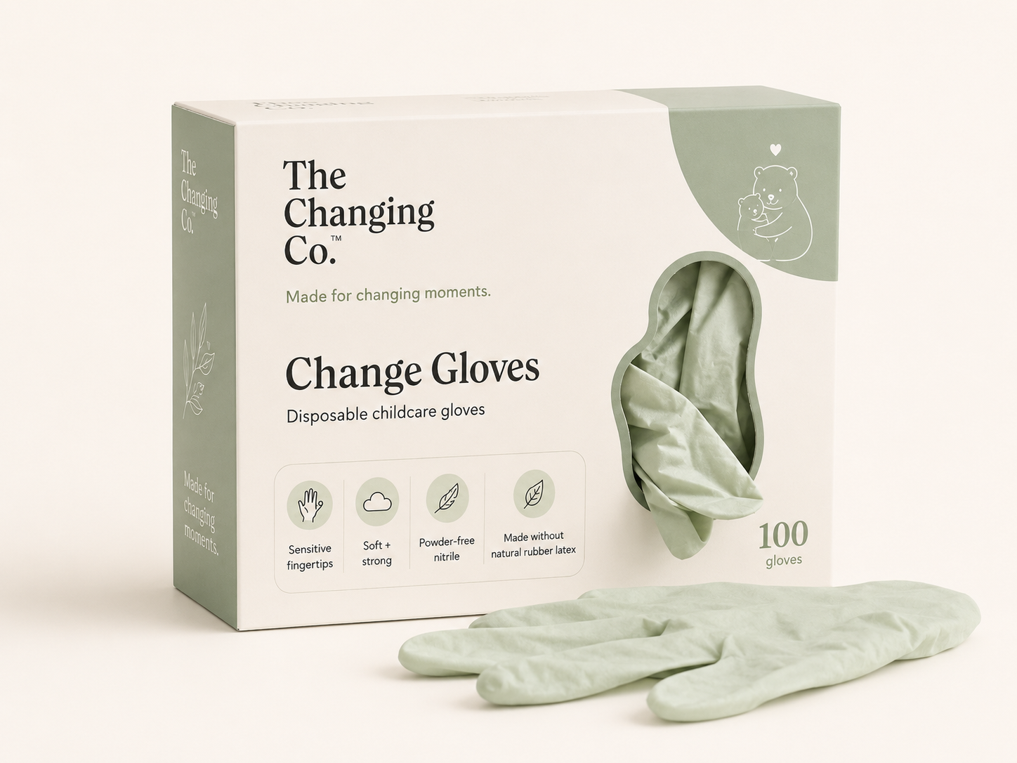 The Changing Co. Change Gloves box with soft sage gloves beside it